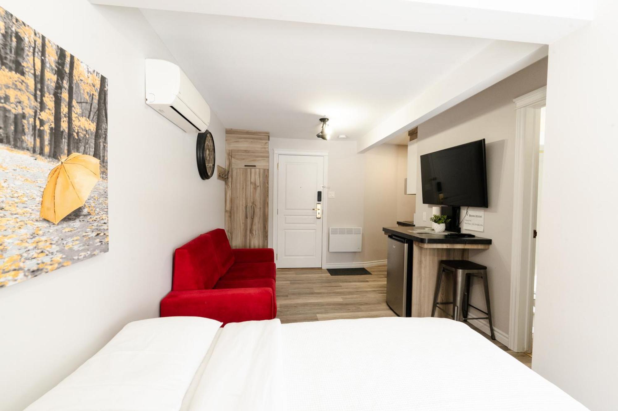 Hotel Les Quatre Bonheurs Амки Екстериор снимка